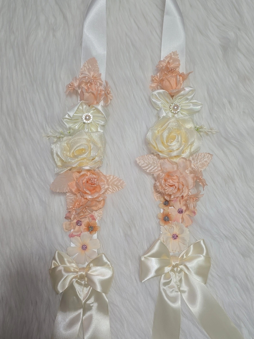 Ivory Satin Ribbon Floral Sashes with Peach & Cream Flowers